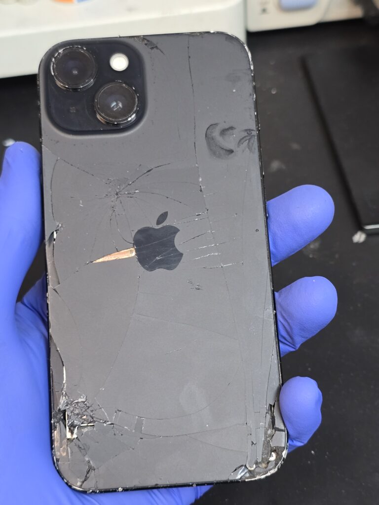iPhone 15 broken back glass before repair at iFix 757 in Virginia Beach.
