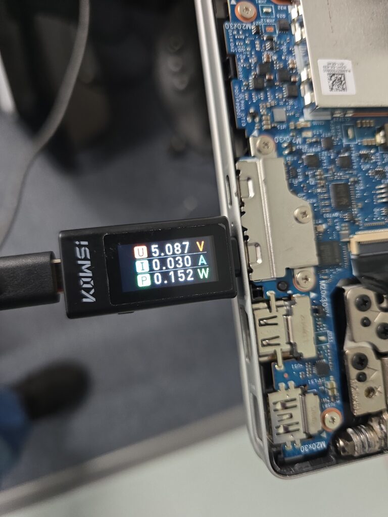 Charging port diagnostic using a USB voltage and wattage meter to test power draw at iFix 757 in Virginia Beach.